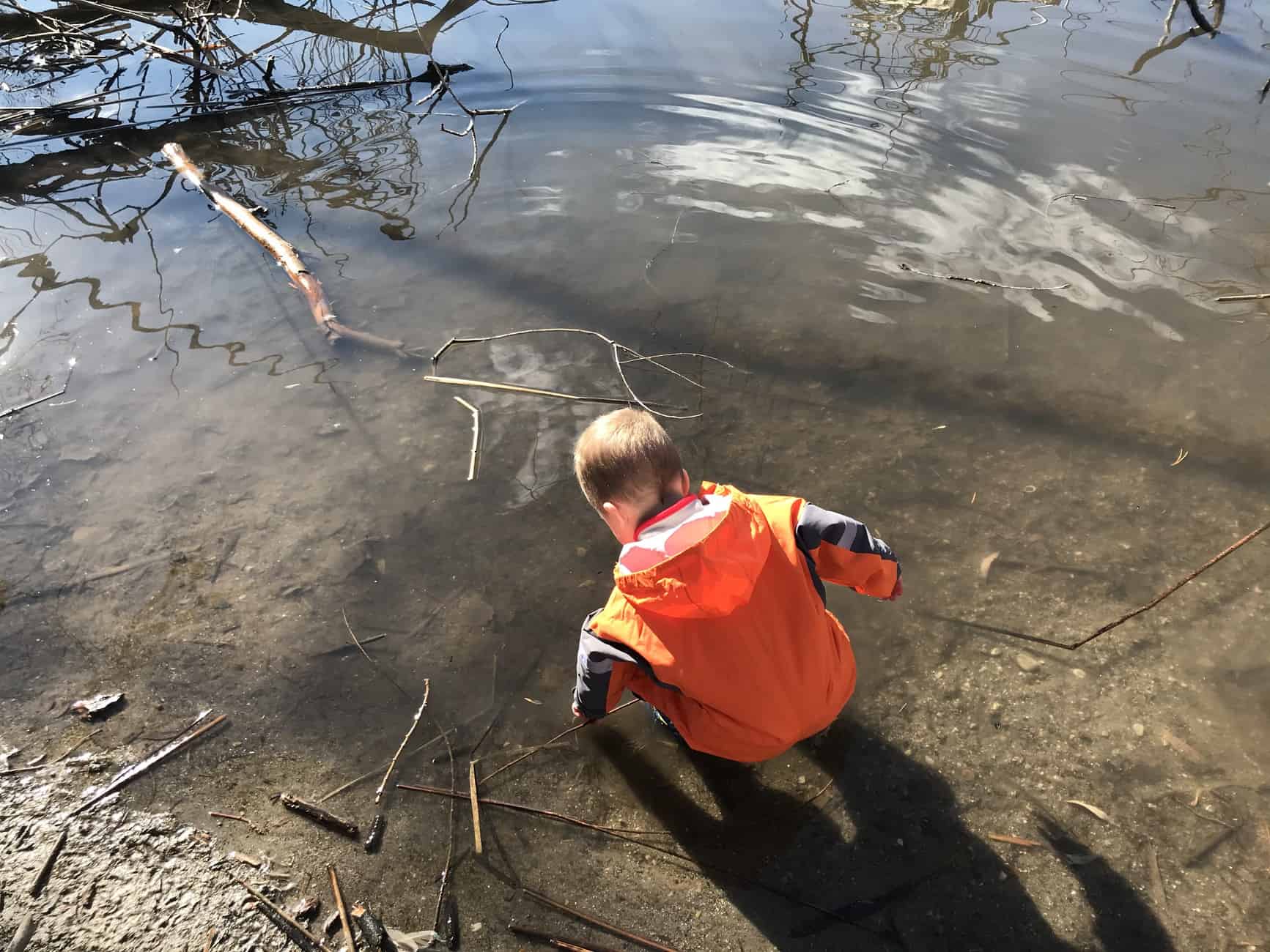 child playing in Beus Pond