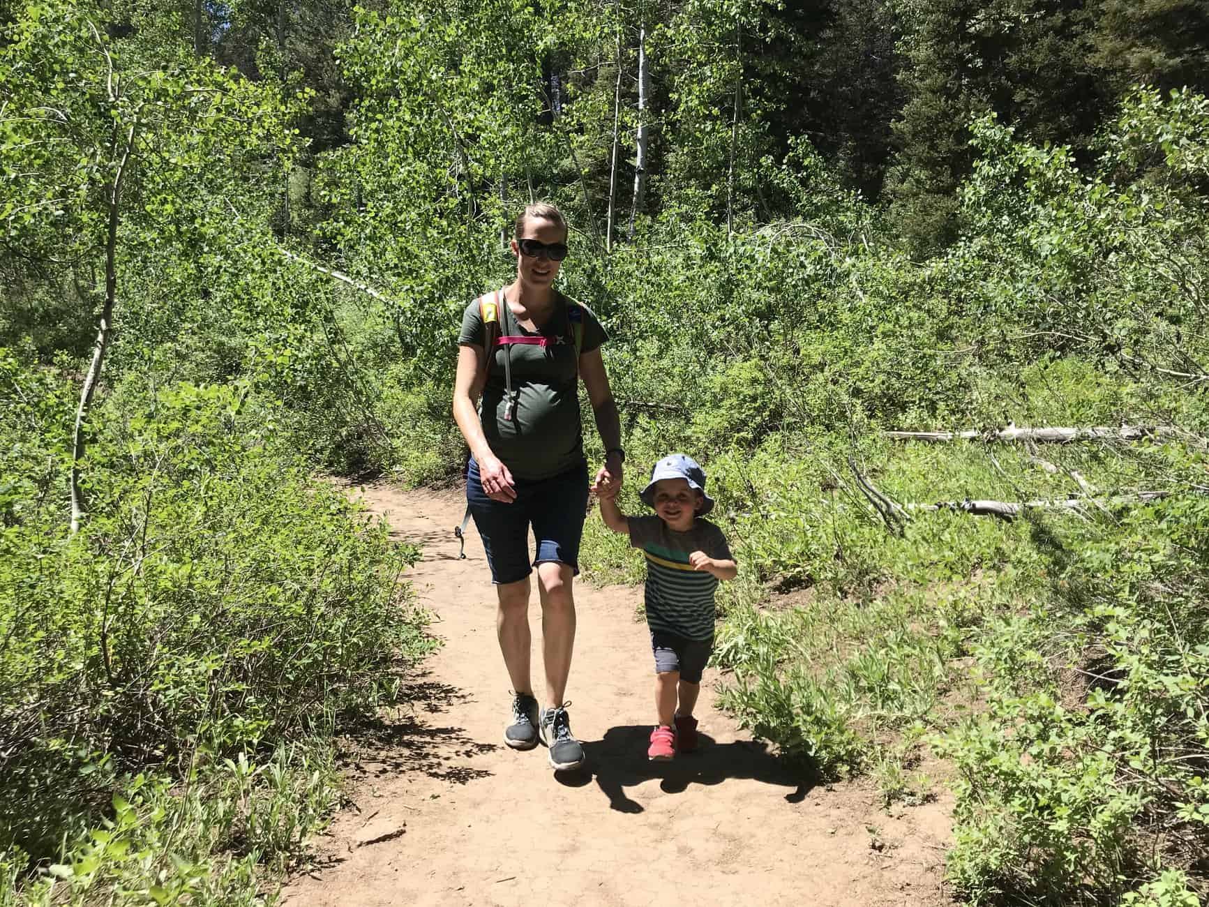 woman hiking with toddler