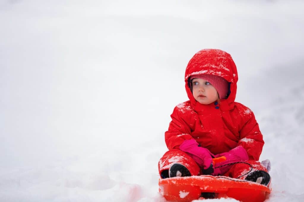 child sledding