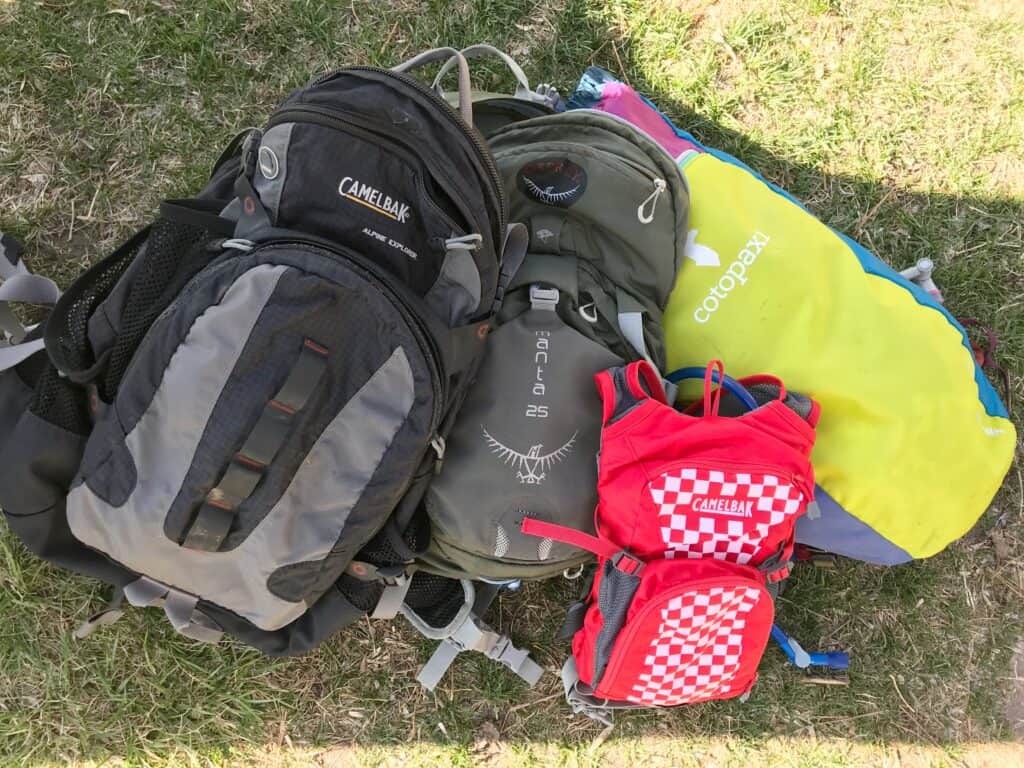 daypacks on grass